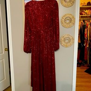 Size medium purchased from a boutique never worn romper